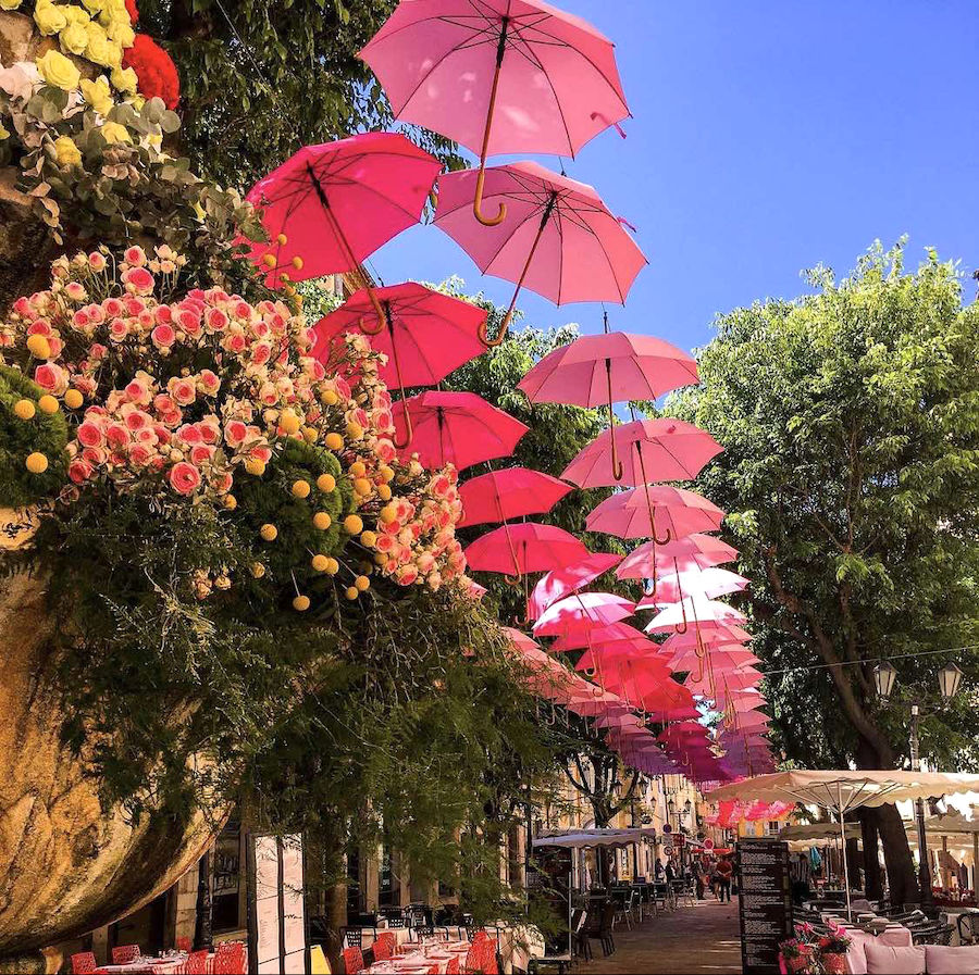 a colourful street in Grasse, France