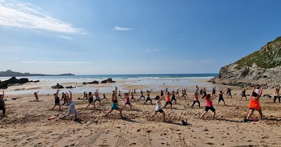 A yoga class on the beach