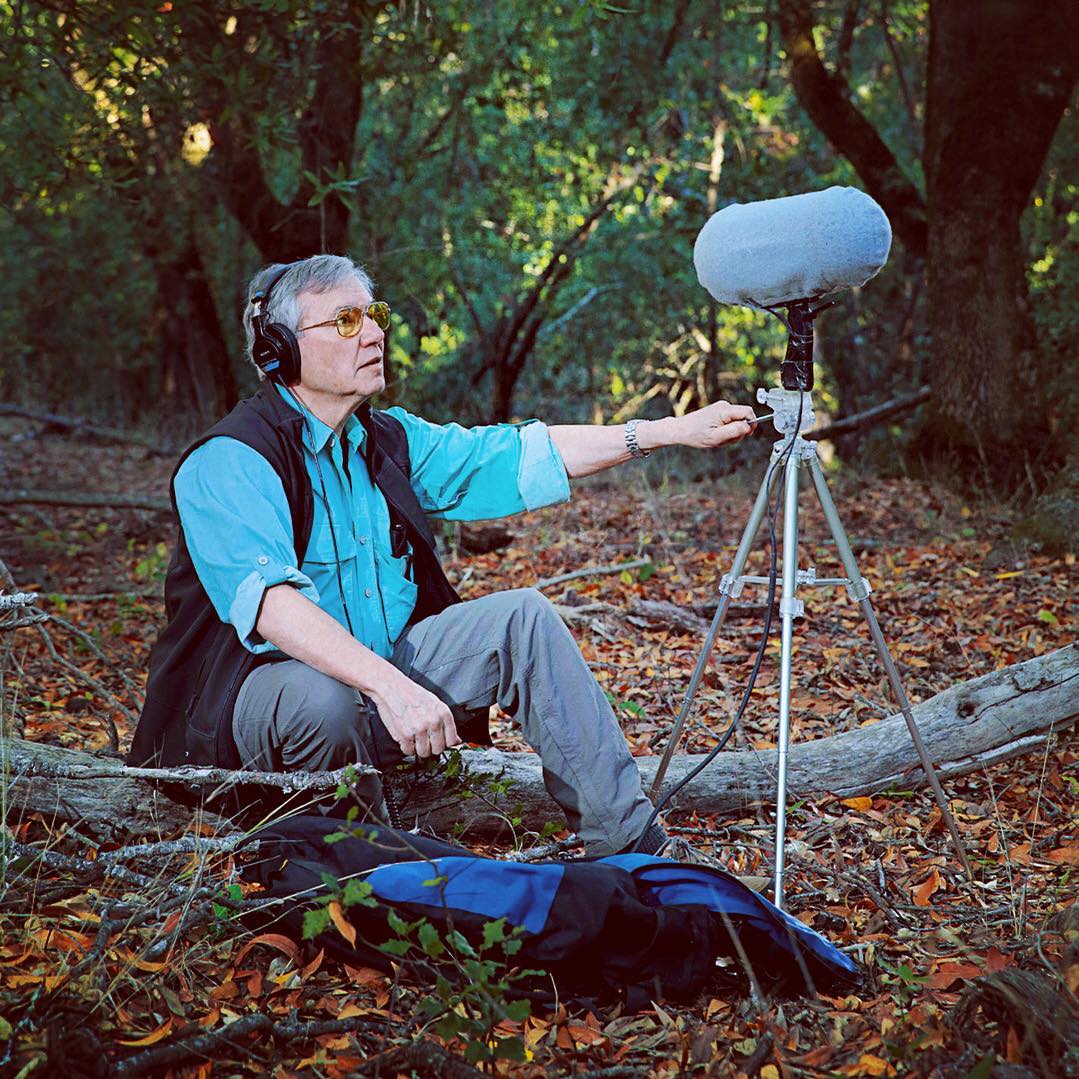 Bernie Krause recording in a forest