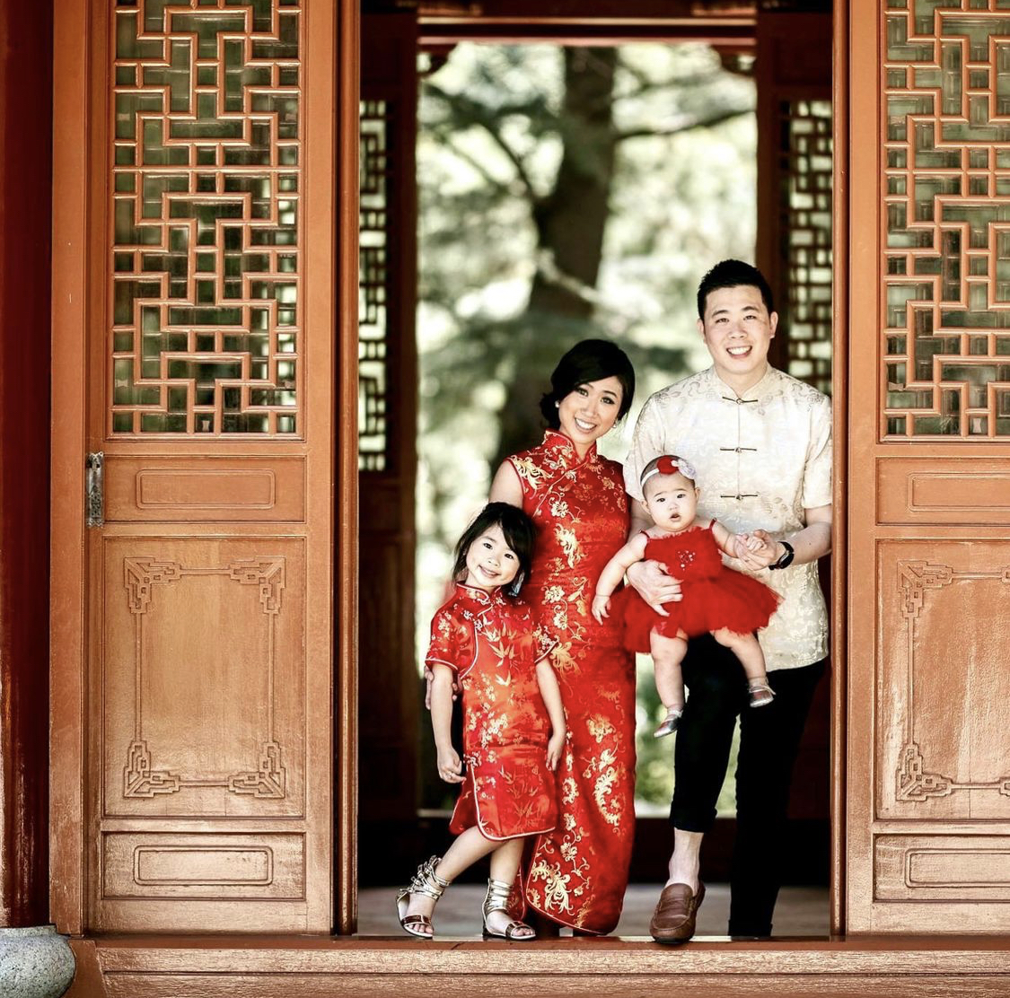 A family celebrating Chinese New Year in traditional attire