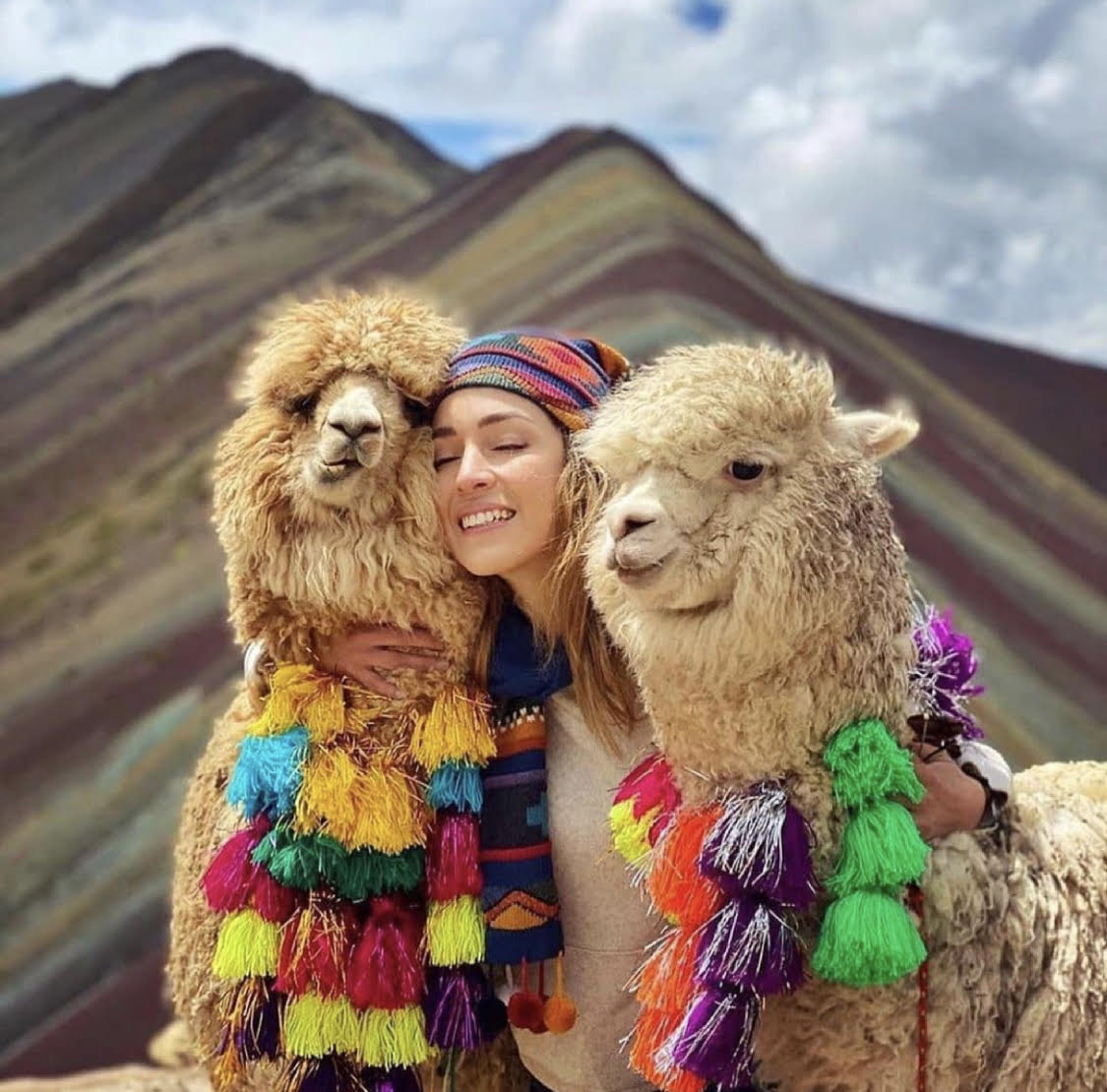 a women with llamas