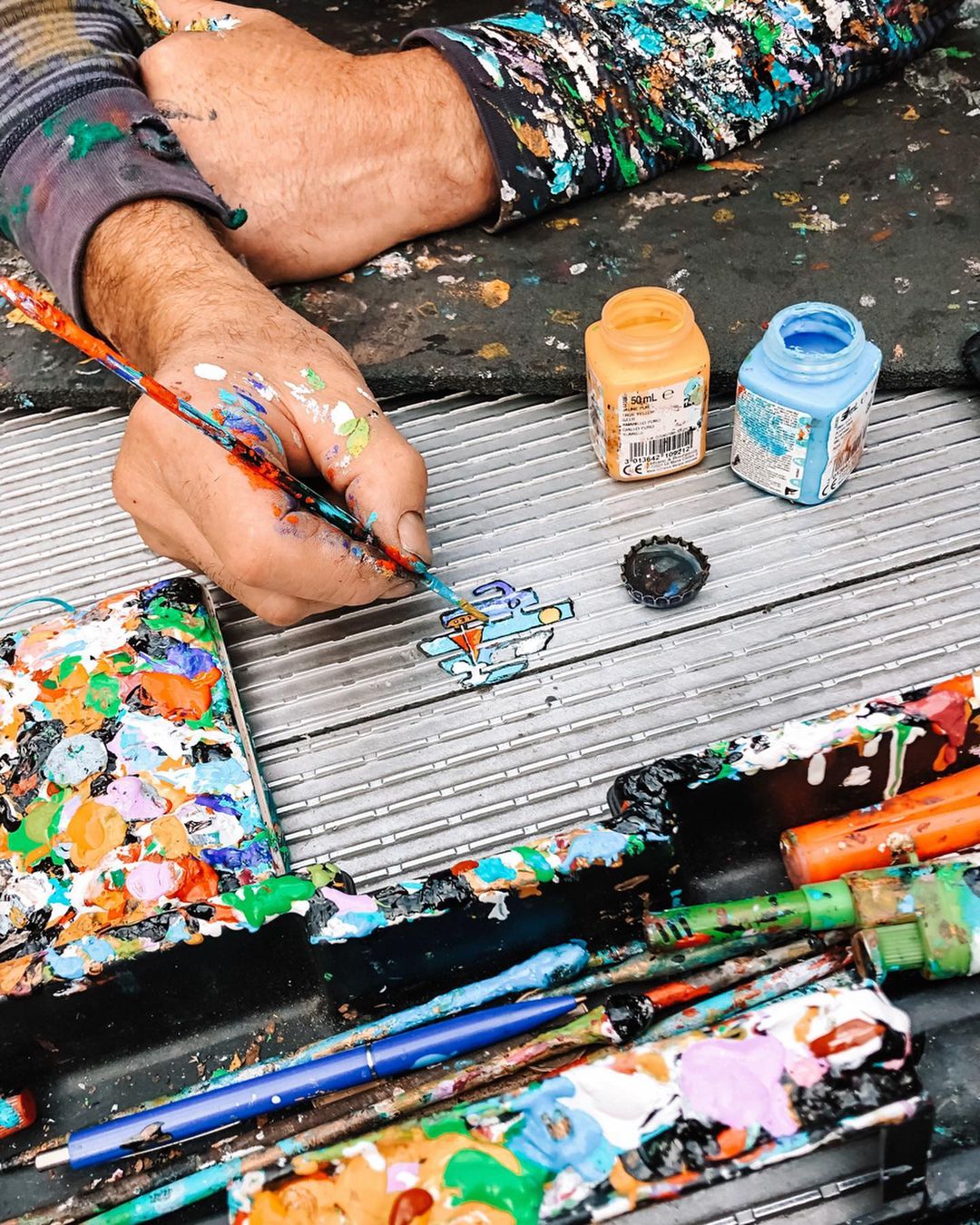 an artist making art from chewing gums