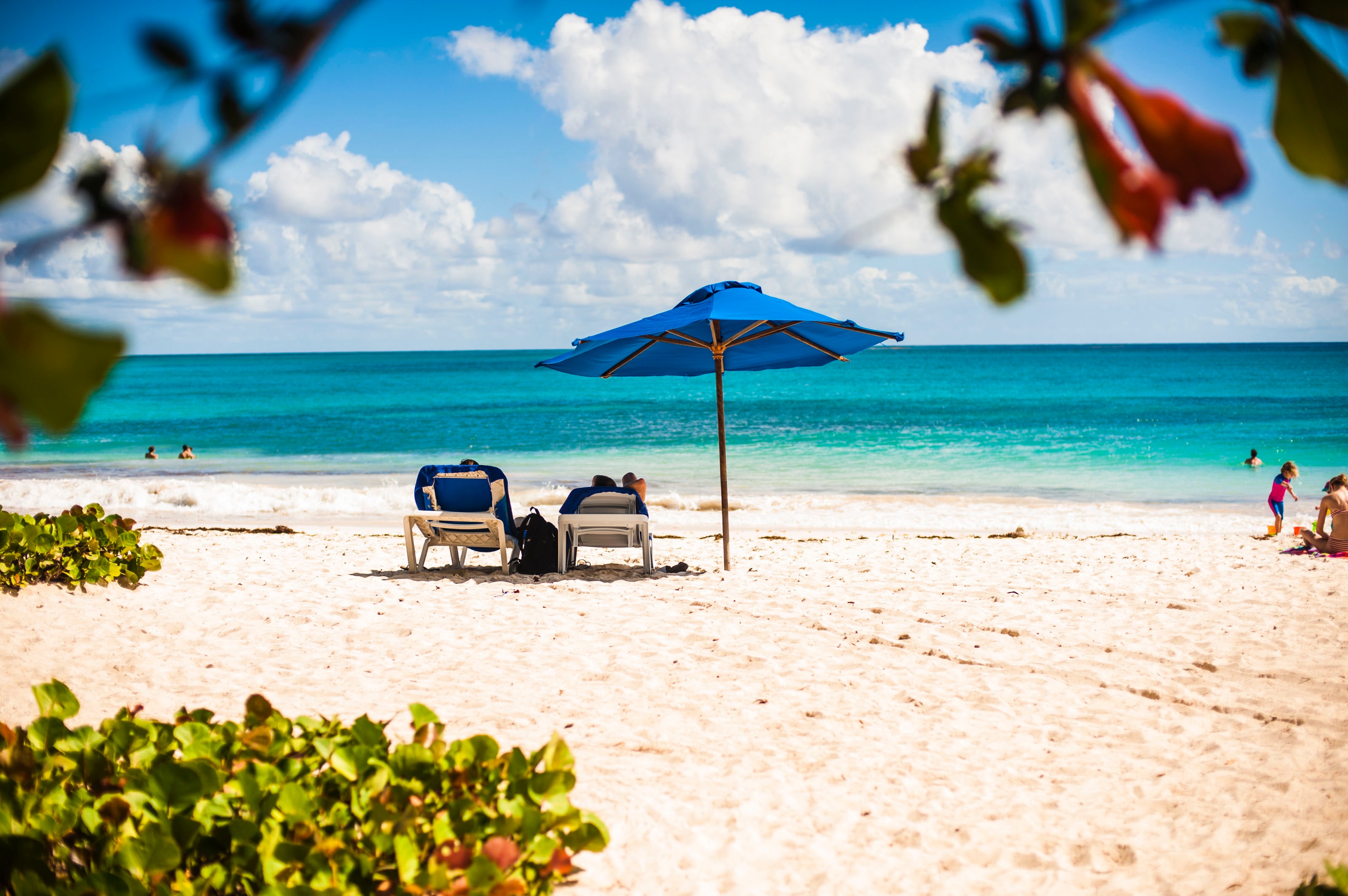 A beach surrounded by blue waters